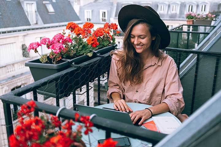 The girl with the hat happily automates photography business with MybizzHive’s photographers CRM